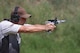 Tech. Sgt. Eric Crotsley fires rounds at Tulsa’s U.S. Shooting Academy in July. The instructor section chief with the 373rd Training Squadron, Detachment 9, was named to the elite Air Force Action Pistol Team this month. Courtesy photo/Released