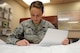 Senior Airman Monica Casanova, 56th Operations Support Squadron airfield management shift lead, references a map against a flight plan at the Luke Air Force Base airfield management office Oct 13 2015. Airfield managers log and keep pilot flight plans to have in case of emergency. (U.S. Air Force photo by Staff Sgt. Staci Miller)
