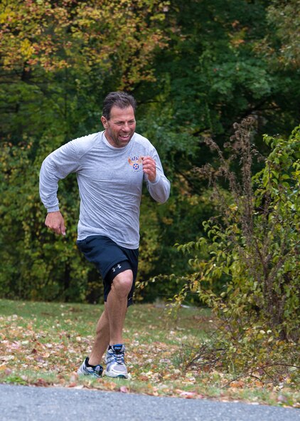 Gerard Cavallo, Foreign Military Sales Division program manager, participates in the Hanscom Fitness and Sports Center's Autumn Classic Relay Oct. 21. Cavallo, and teammate Stephen Henning, placed first in the race with a time of 24 minutes 26 seconds. (U.S. Air Force photo by Mark Herlihy)