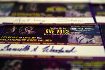 A signed pledge form documents an Airman’s commitment to live by the Air Force core values and prevent domestic violence on Oct. 8, 2015, at Andersen Air Force Base, Guam. Members assigned to the 36th Medical Operations Squadron Family Advocacy Program hosted multiple events to raise awareness about domestic violence including information booths, a dodgeball tournament and an exhibition scheduled for the end of the month. (U.S. Air Force photo by Airman 1st Class Alexa Ann Henderson/Released)