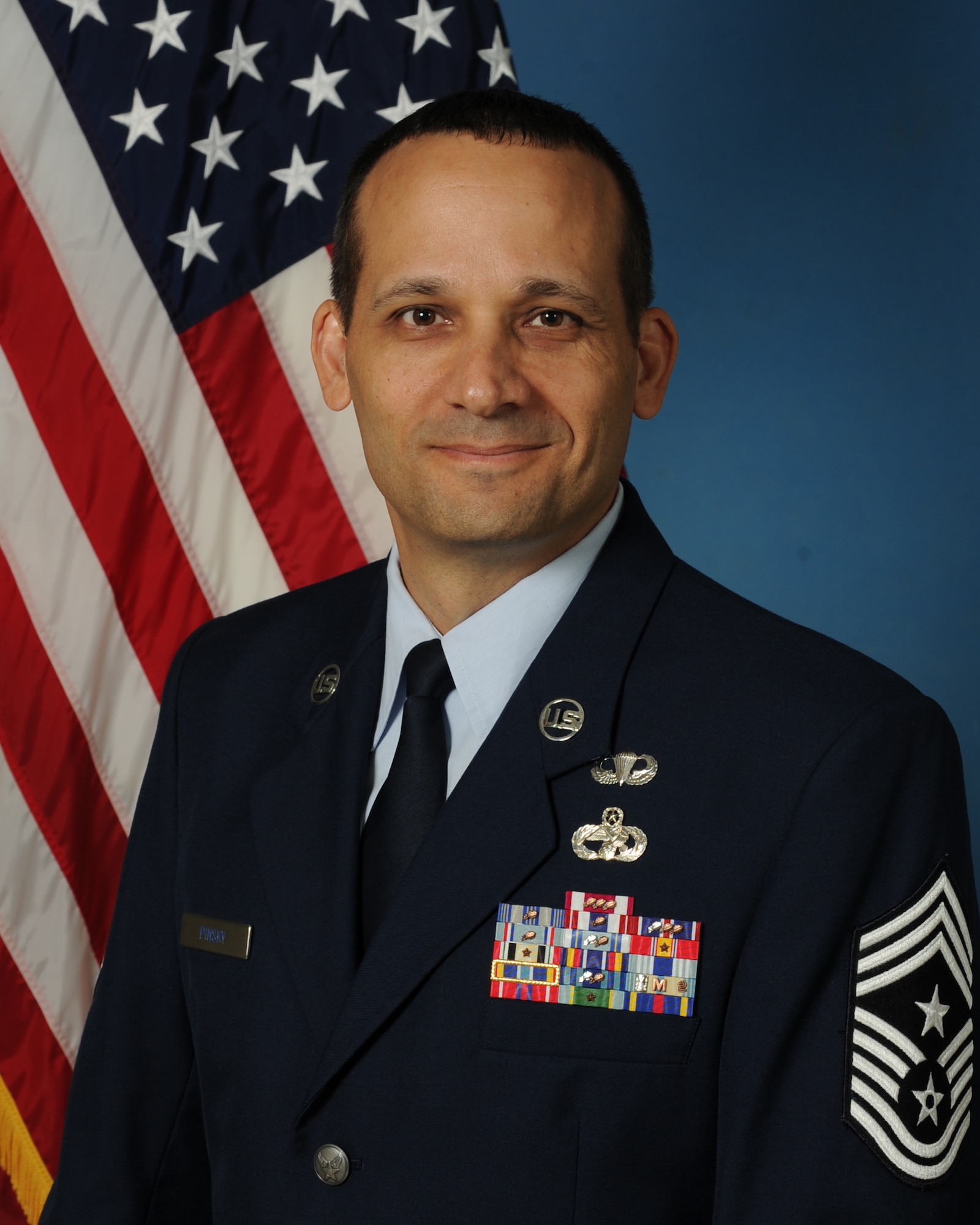 The official portrait of the fifth 433rd Airlift Wing Command Chief Brian Pinsky.