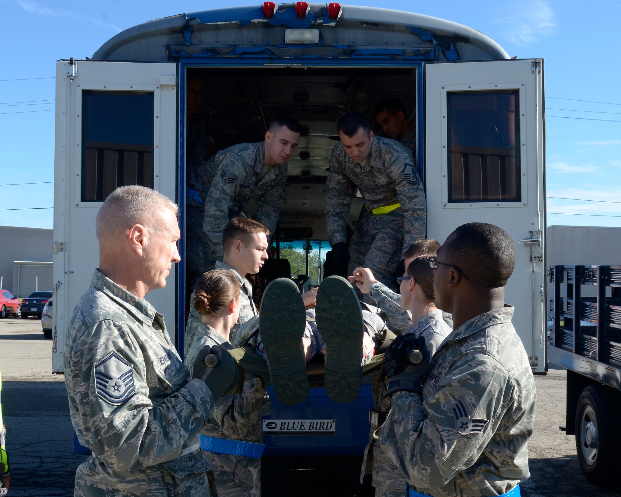 WRIGHT-PATTERSON AIR FORCE BASE, Ohio – Reservists assigned to the 445th Aeromedical Staging Squadron prepare to transport a patient to the flight line for a simulated medical evacuation during the ASTS “Victory or Death – Heal and Defend” exercise Oct. 4, 2015. Approximately 70 Airmen participated in the 24-event exercise designed to accomplish annual and quarterly mandatory and ancillary training. (U.S. Air Force photo/Senior Airman Joel McCullough)