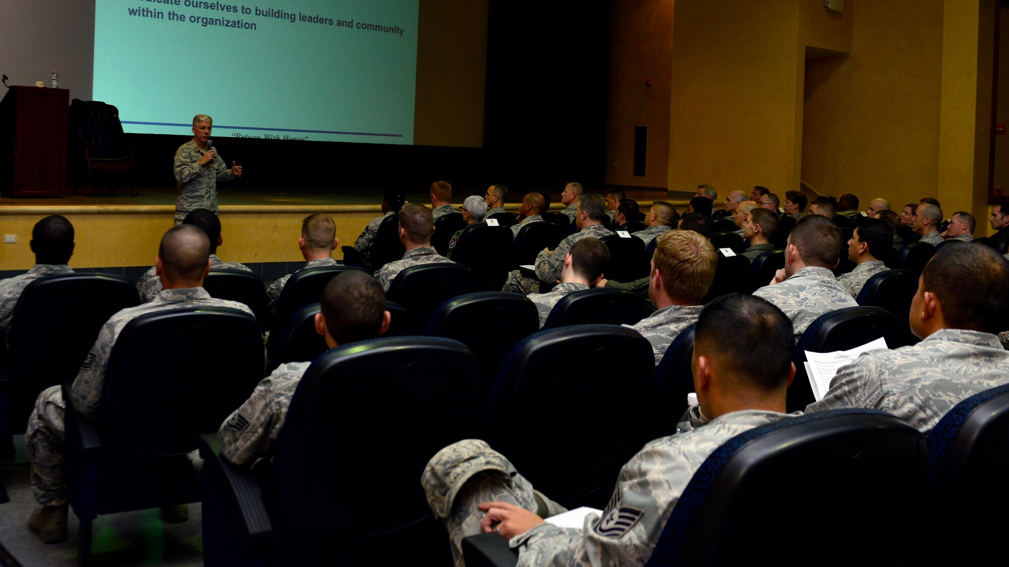 Gen. Barre Seguin, 31st Fighter Wing commander, speaks to Team Aviano on the importance of leadership at a servant leadership seminar, Oct. 20, 2015, at Aviano Air Base, Italy. Two seminars provided valuable information on servant leadership to help build high-performance teamwork and future leaders. (U.S. Air Force photo by Airman 1st Cary Smith/Released)