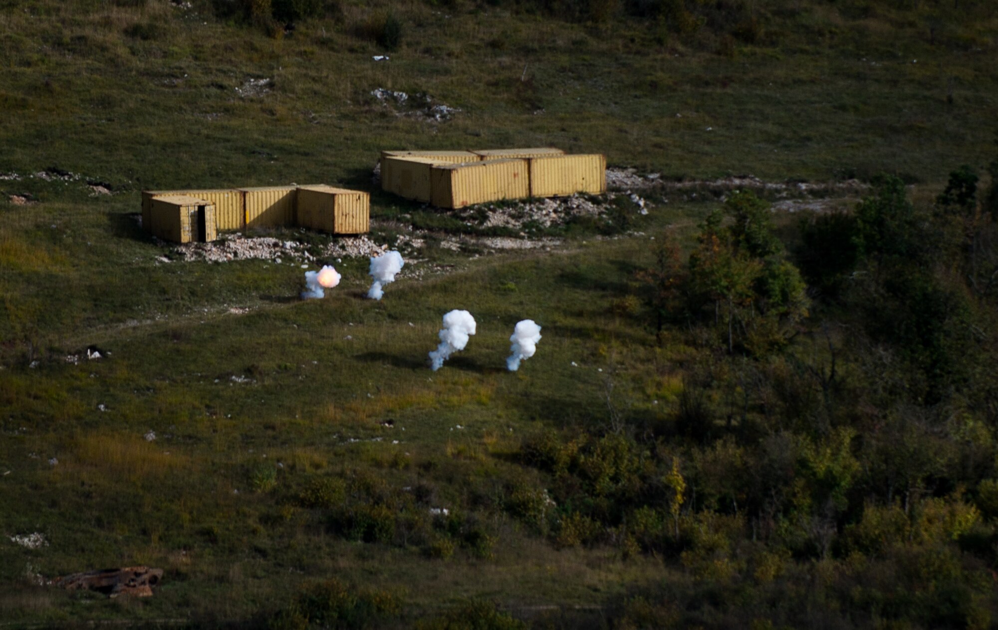 Bombs dropped from a Slovenian PC-9M Hudournik aircraft explode during live-fire training Oct. 16, 2015, at the Pocek Training Range, near Postojna, Slovenia. The PC-9Ms were controlled by U.S. Air Force joint terminal attack controllers who provided support to U.S. Army units training in the range for exercise Rock Proof V. (U.S. Air Force photo/Staff Sgt. Armando A. Schwier-Morales)