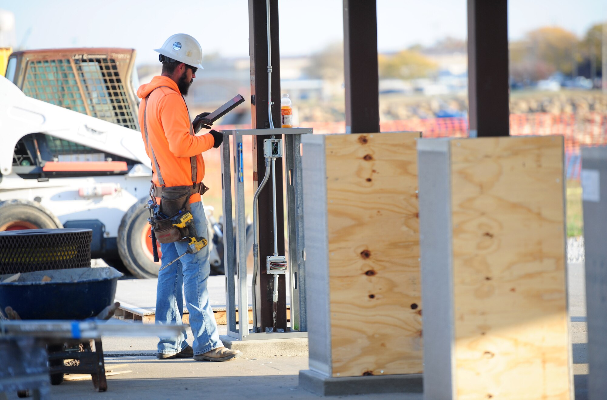 Dustin Rodgers, a construction carpenter, frames a pavilion column Oct. 21, 2015, at Whiteman Air Force Base, Mo. The renovation of the pavilion and surrounding structures includes upgrades to the existing shelters and replacing the stage with fabric canopy structures. The pavilion and stage area is scheduled to be closed until mid-December 2015. (U.S. Air Force photo by Airman 1st Class Jazmin Smith/Released)
