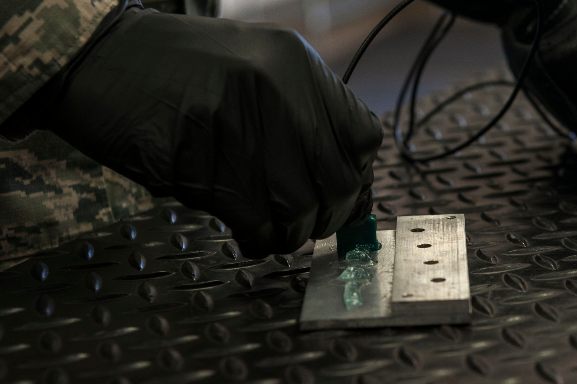 An aircraft component is inspected with a sonogram Oct. 14, 2015, at Little Rock Air Force Base, Ark. Non-destructive inspection Airmen search for faulty pieces using a variety of ways such as probing, chemical baths and sonograms. (U.S. Air Force photo by Airman 1st Class Mercedes Muro) 