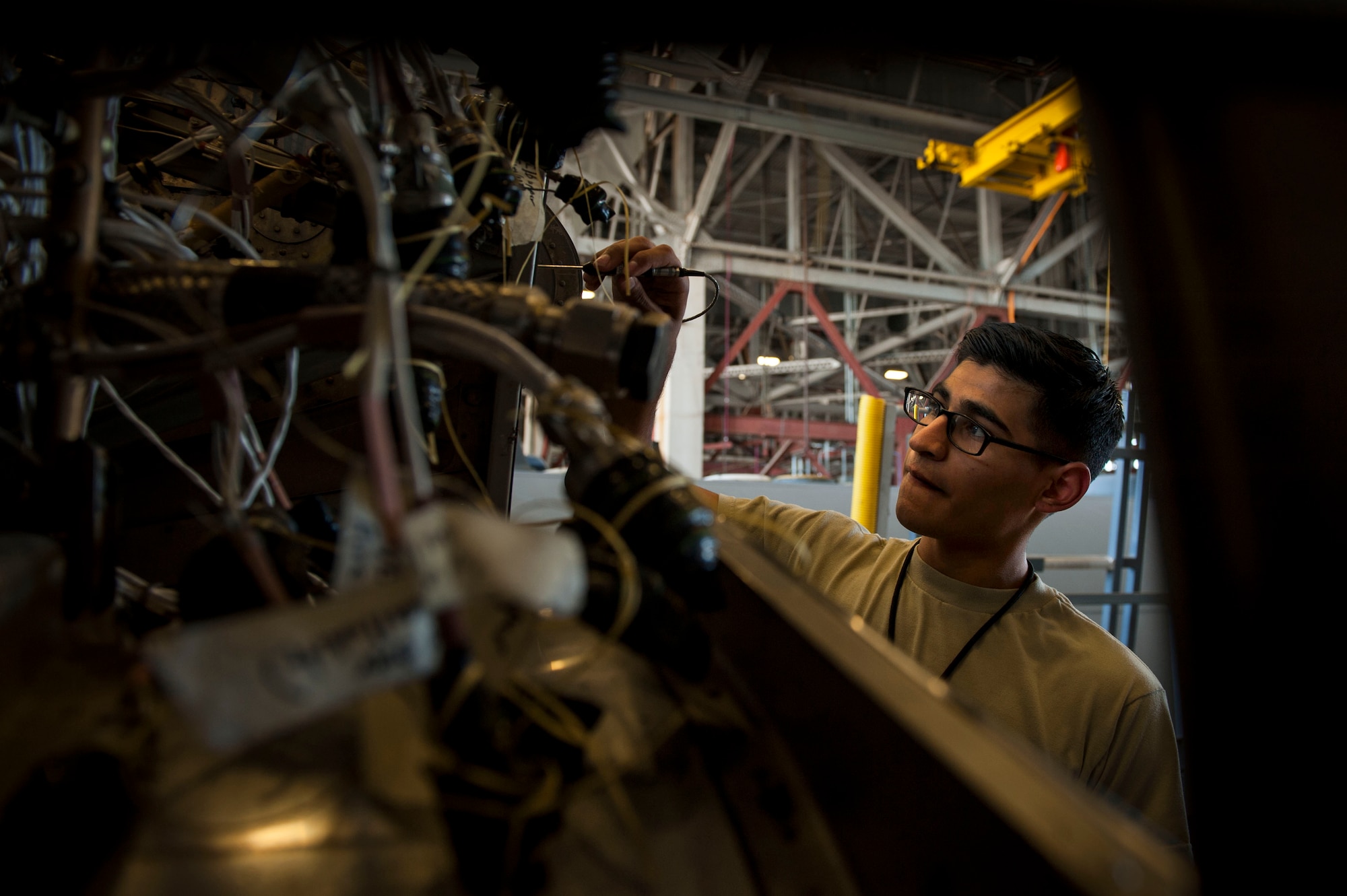 Airman 1st Class Joshua Fernandez, a 19th Maintenance Squadron nondestructive inspection apprentice, performs an Eddy Current test Oct. 14, 2015, at Little Rock Air Force Base, Ark. An eddy current test is an electromagnetic testing method used to check the structural integrity of an aircraft. (U.S. Air Force photo by Senior Airman Stephanie Serrano) 