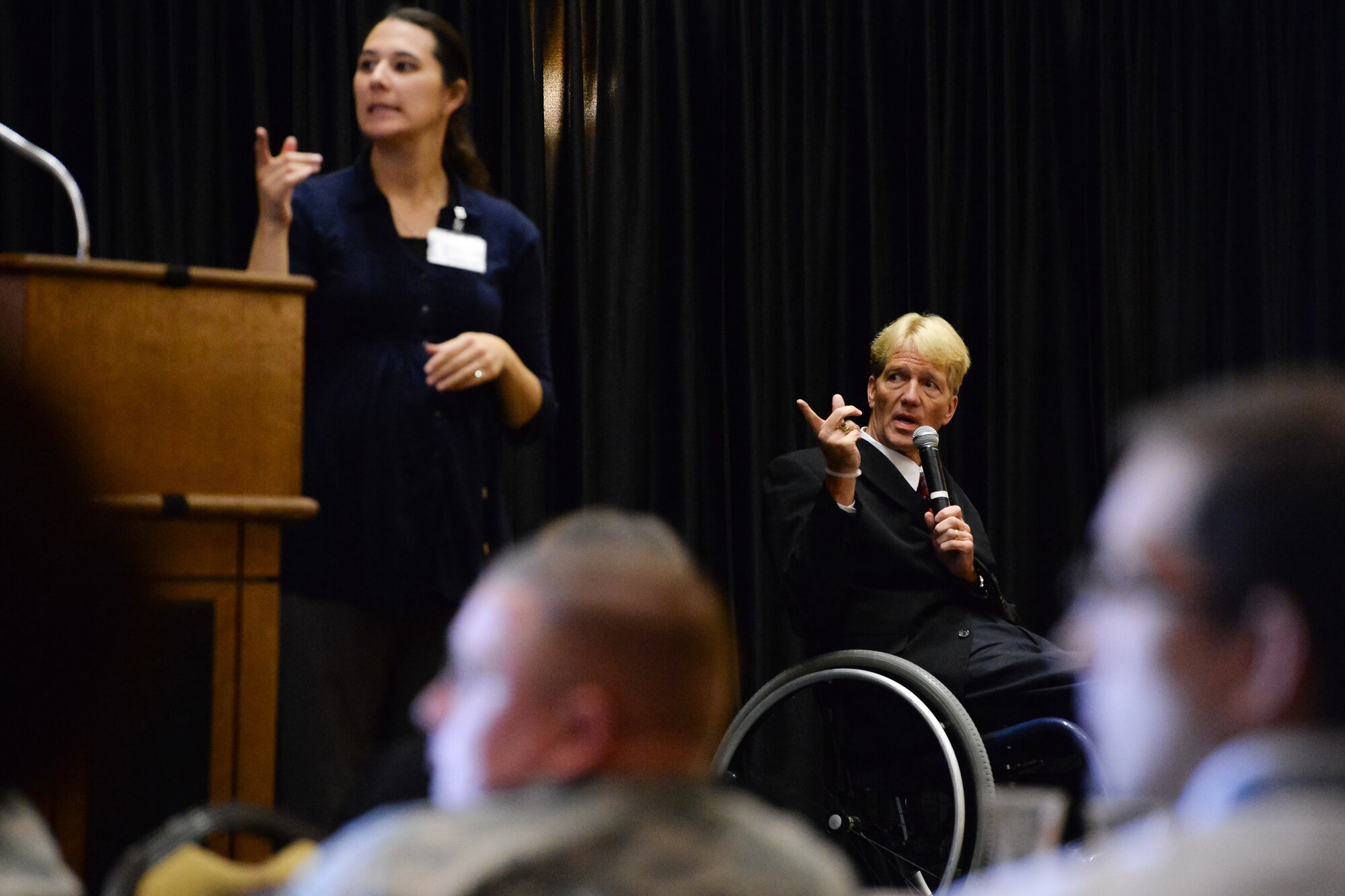 Todd Henrie, 309th Software Maintenance Group, speaks during the Persons with Disabilities annual awards luncheon at Hill Air Force Base, Utah, Oct. 22, 2015. Henrie, who began his federal career as a summer hire, shared personal stories and explained how his disability has not held him back from the outdoor activities he enjoys. (U.S. Air Force photo by R. Nial Bradshaw)