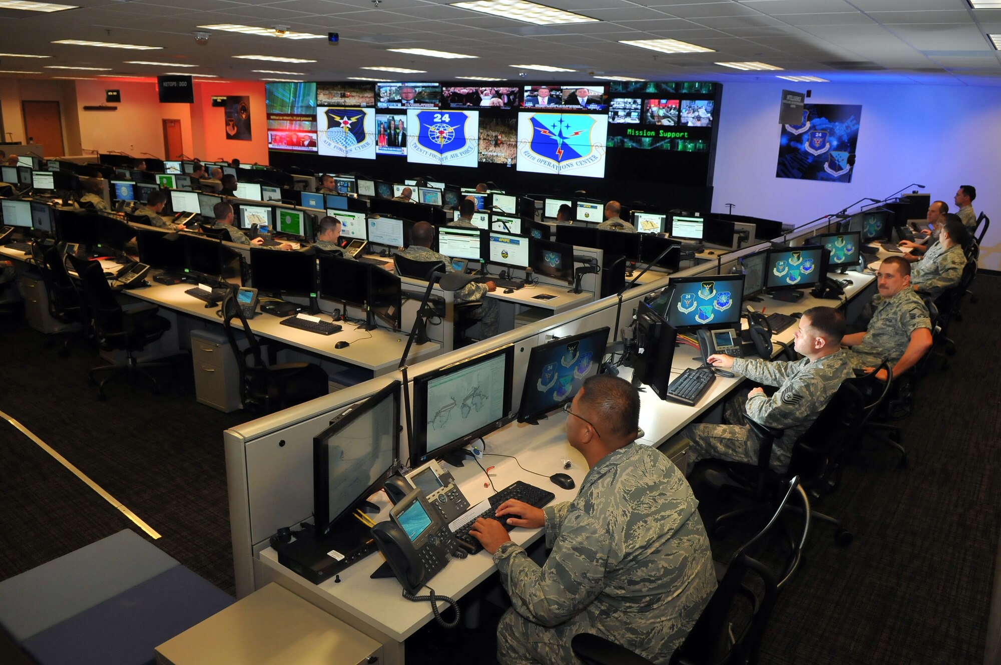 Cyber Airmen from the 24th Air Force at Joint Base San Antonio-Lackland work cyber issues. Cyber warfare operations is now included on the special duty assignment pay list. (Courtesy Image)