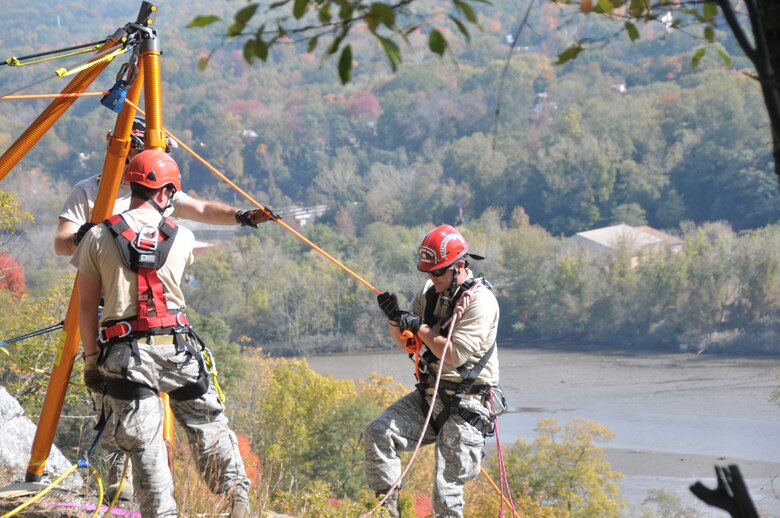 Tech. Sgt. Adam Myers, 109th Fire Department urban search and rescue team NCOIC at Stratton Air National Guard Base, completes high angle training during a joint search and rescue training exercise Oct. 21, 2015 at Camp Smith, New York, with the 106th Rescue Wing out of Long Island. The 109th USAR team, the lead within the New York Air National Guard, is currently the only self-sufficient fully capable mobile unit in the Air National Guard. (U.S. Air National Guard photo by Tech. Sgt. Catharine Schmidt/Released)