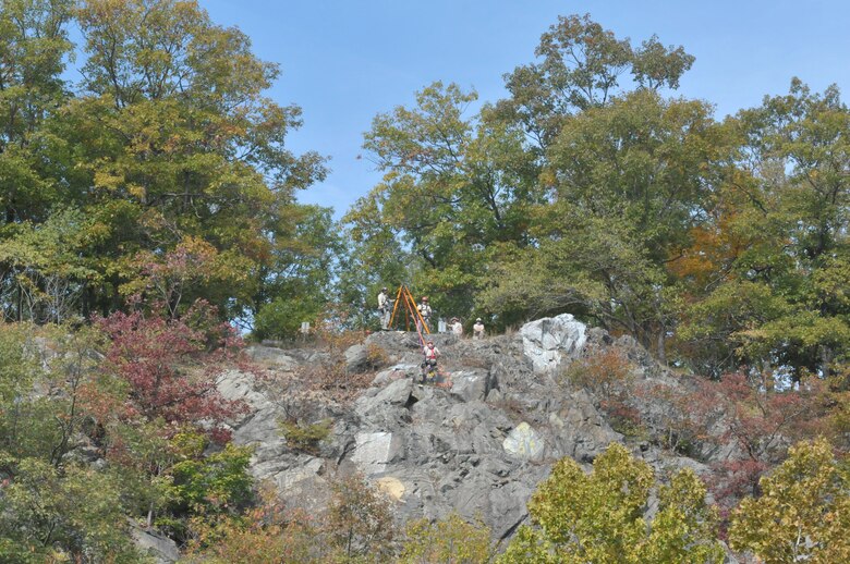 The New York Air National Guard's 109th and 106th Fire Departments' urban search and rescue teams complete high angle training during a joint search and rescue training exercise Oct. 21, 2015 at Camp Smith, New York. The 109th USAR team, the lead within the New York Air National Guard, is currently the only self-sufficient fully capable mobile unit in the Air National Guard. (U.S. Air National Guard photo by Tech. Sgt. Catharine Schmidt/Released)