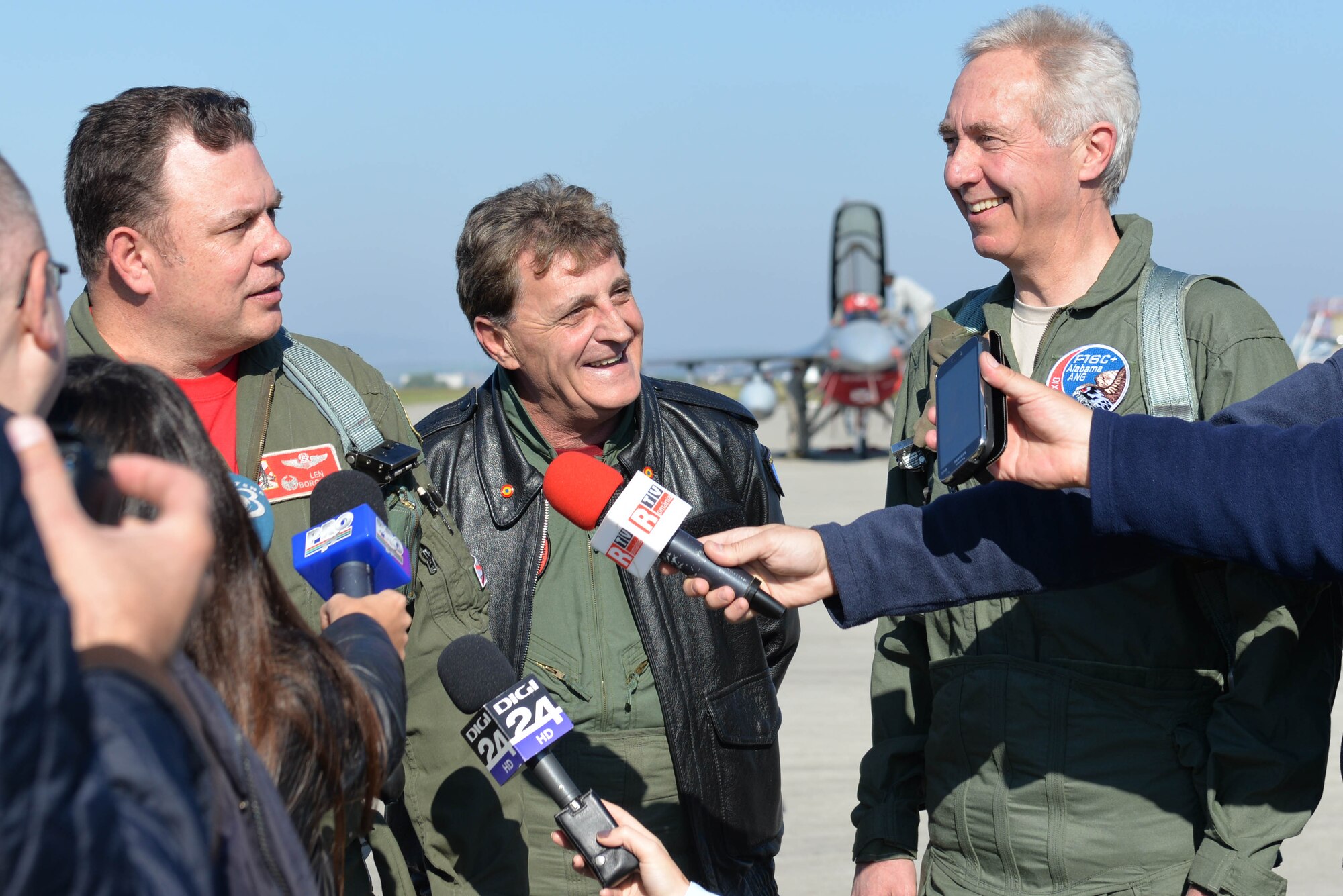 Romanian Minister of Defense, Mircea Duşa; U.S. Ambassador to Romania, Hans Klemm; and F-16 pilot, Col. Len Borowski of the 187th Fighter Wing, Alabama Air National Guard, answer questions for the Romanian media during the exercise Dacian Viper DV day at Campia Turzii, Romania, Oct. 16, 2015. Exercise Dacian Viper is a flying training deployment between the Alabama Air National Guard and Romanian Air Force designed to increase readiness to conduct combined air operations and to meet future security challenges. (U.S. Air Force photo byCapt. Lauren Ott/Released)