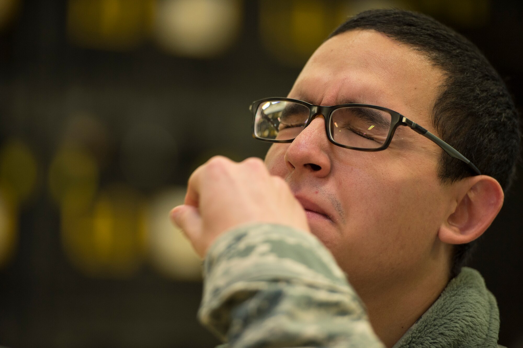U.S. Air Force Airman 1st Class Joel Castro, 52nd Aircraft Maintenance Squadron, aerospace propulsion, receives his flu mist during a disease containment plan exercise Oct. 21, 2015, at Spangdahlem Air Base, Germany. The flu mist or flu shot is an annual requirement for service members. (U.S. Air Force photo by Staff Sgt. Christopher Ruano/Released)