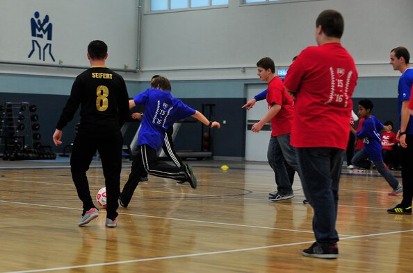 James Lucas, Ramstein Middle School student, kicks a soccer ball into a goal during the Kaiserslautern Military Community Adaptive Games soccer event Oct. 15, 2015, at Vogelweh Military Complex, Germany. The Adaptive Sports events give the students the opportunity to meet students from other schools and members of the Kaiserslautern Military Community. (U.S. Air Force photo/Airman 1st Class Larissa Greatwood)