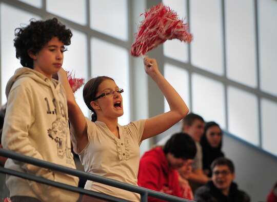 High School students cheer in the stands during the Kaiserslautern Military Community Adaptive Sports soccer event Oct. 15, 2015, at Vogelweh Military Complex, Germany. The Adaptive Sports events give the students the opportunity to have fun, stay fit and be recognized for their efforts. (U.S. Air Force photo/Airman 1st Class Larissa Greatwood)