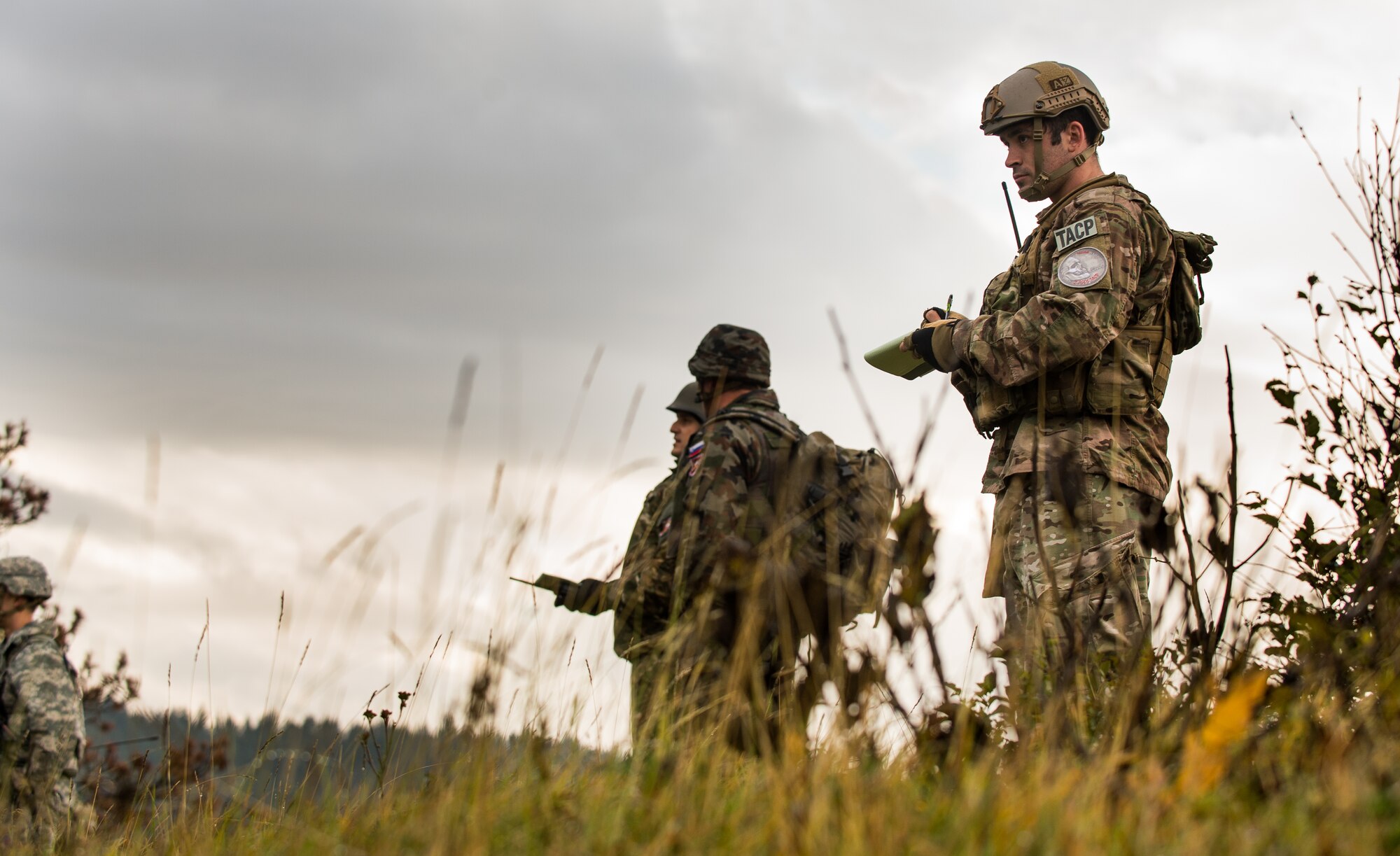 U.S. Air Force Senior Airman CJ Farrell, 2nd Air Support Operations Squadron joint terminal attack controller in training, sketches a map of the training area prior to providing close air support for U.S Army units Oct. 16, 2015, at Pocek Training Range, near Postojna, Slovenia. The 2nd ASOS integrated with the 2nd Battalion, 503rd Infantry Regiment to provide support for exercise Rock Proof V. (U.S. Air Force photo/Staff Sgt. Armando A. Schwier-Morales)