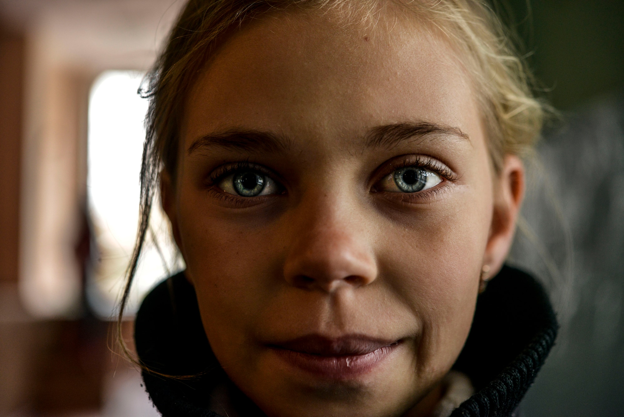 A Moldovan student poses for a photo Oct. 19, 2015, at Liceul Teoretic Alexei Mateevici School, Sanatauca, Moldova. Approximately seven Airmen from the 435th Construction and Training Squadron and the 52nd Civil Engineer Squadron worked on the renovations since Sept. 23. The renovations were part of the Moldova Humanitarian and Civic Assistance program is part of a military and civilian theater security cooperation program the U.S. European Command uses to directly impact civilian communities throughout 17 countries, primarily in Eastern Europe.(U.S. Air Force photo/Senior Airman Nicole Sikorski) 