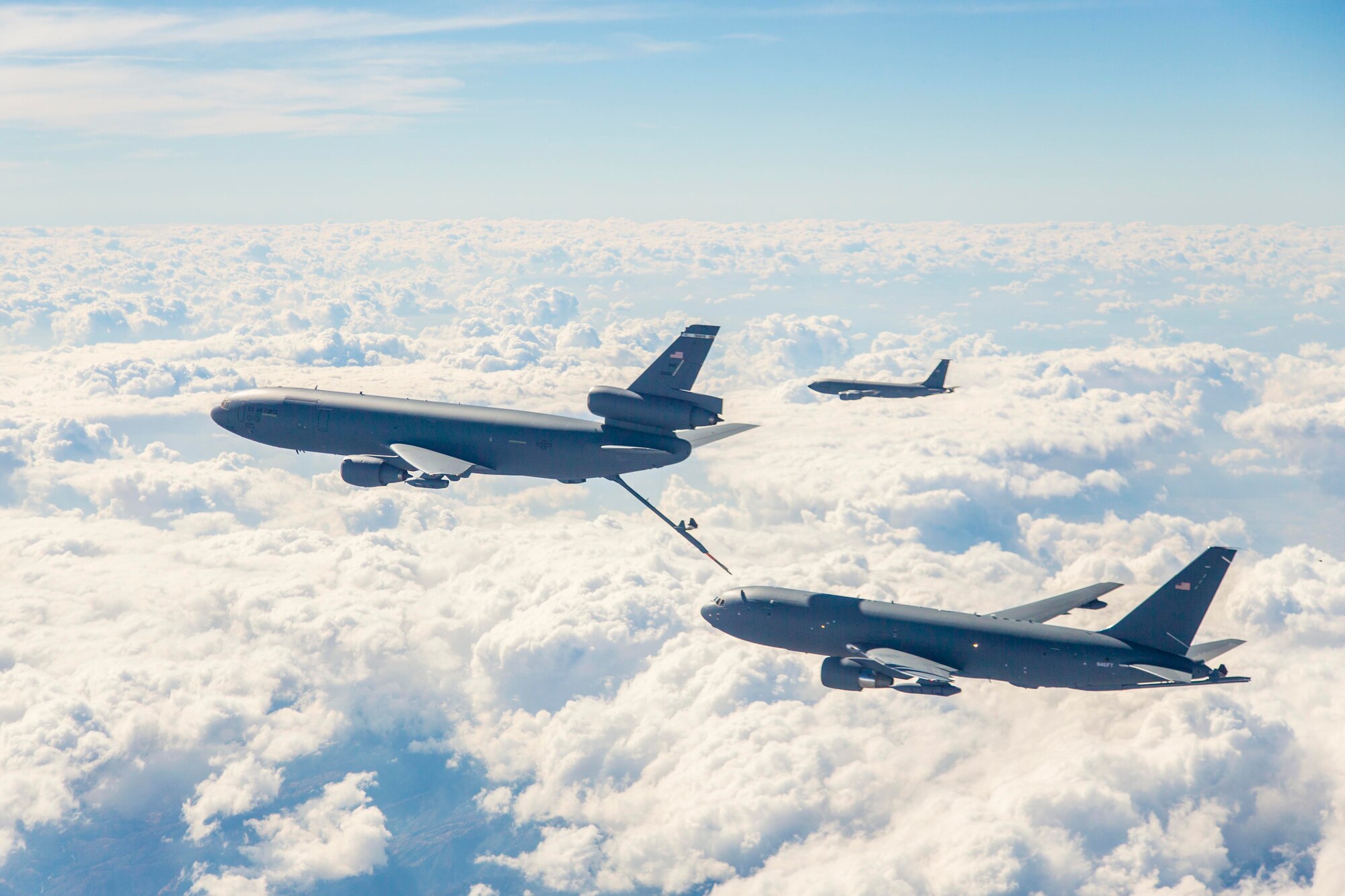 Boeing and the 418th Flight Test Squadron are conducting ground effects and fuel onload fatigue testing on the new KC-46A Pegasus. Fuel onload fatigue tests will gather data to characterize the aircraft interaction typically experienced when the KC-46A is flying in receiver formation behind a current KC-135 Stratotanker or KC-10 Extender. While the KC-46's role is to refuel other aircraft, it too may need to be refueled from other KC-10s or KC-135s to extend its range. Fuel onload fatigue testing is the first look at the KC-46 acting in that role. (U.S. Air Force photo/Christopher Okula) 
