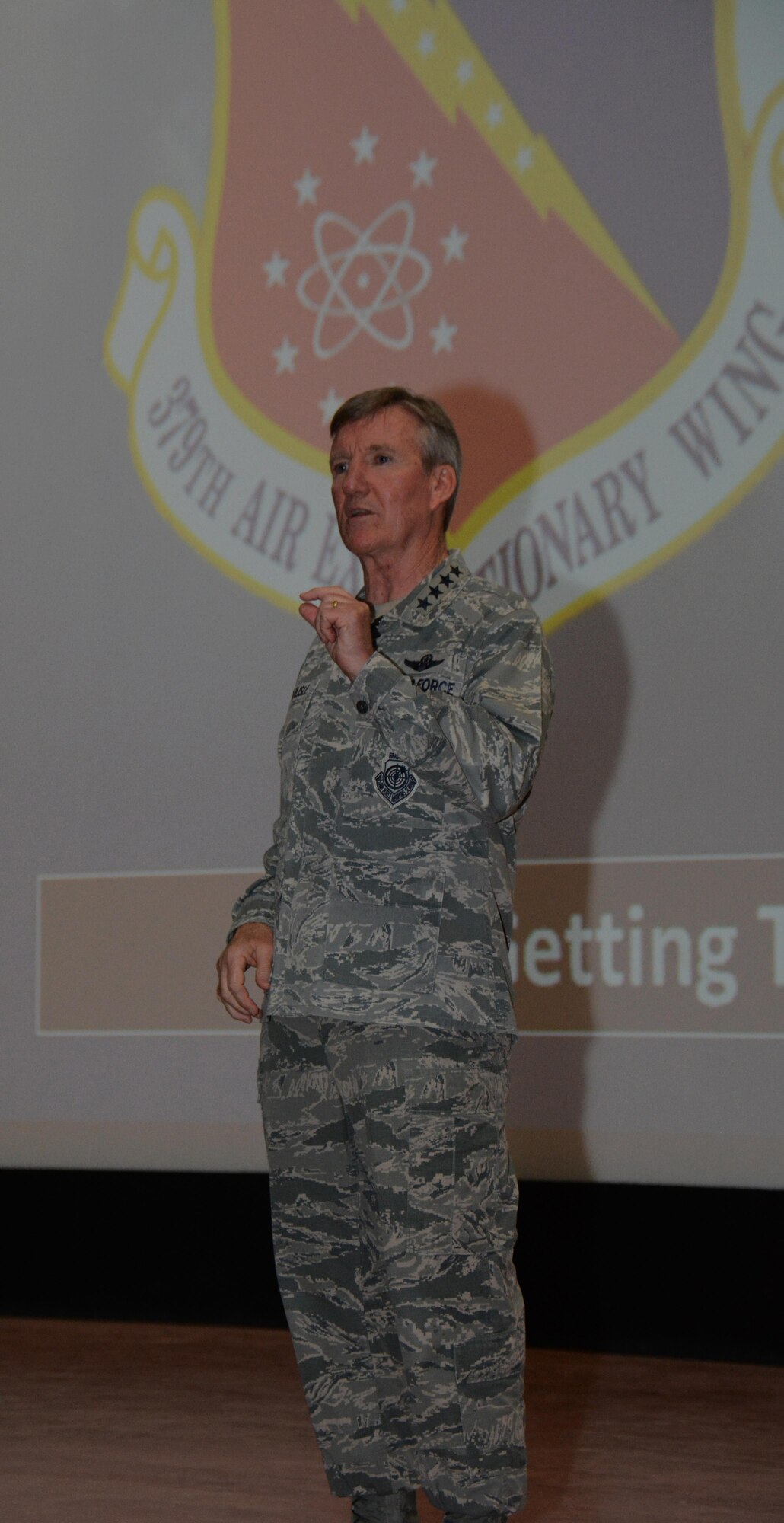 U.S. Air Force Gen. Hawk Carlisle, commander of Air Combat Command, address more than 300 members of Al Udeid Air Base, Qatar during an all-call event at the Coalition Compound Theater Oct. 21, 2015. During the all-call, Carlisle emphasized the importance of being resilient, preventing suicide and ending sexual assault. (U.S. Air Force photo by Tech. Sgt. James Hodgman/Released)
