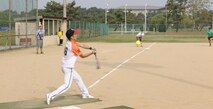Members from the U.S. and Republic of Korea air forces play softball during the Korean and American Friendship Day at Kunsan Air Base, Republic of Korea, Oct. 23, 2015. They participated in activities throughout the day to celebrate and strengthen the partnership shared by the ROK and U.S. (U.S. Air Force photo by Senior Airman Dustin King/Released) 

