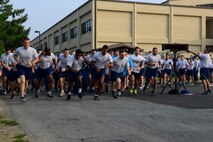 Members from the U.S. and Republic of Korea air forces take-off during the morning 5k run to start the Korean and American Friendship Day off at Kunsan Air Base, Republic of Korea, Oct. 23, 2015. They participated in activities throughout the day to celebrate and strengthen the partnership shared by the ROK and U.S. (U.S. Air Force photo by Senior Airman Ashley L. Gardner/Released) 