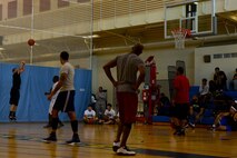 Members from the U.S. and Republic of Korea air forces participate in a three on three basketball game as one of the events during the Korean and American Friendship Day at Kunsan Air Base, Republic of Korea, Oct. 23, 2015. They participated in activities throughout the day to celebrate and strengthen the partnership shared by the ROK and U.S. (U.S. Air Force photo by Senior Airman Ashley L. Gardner/Released) 
