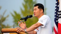 Republic of Korea air force Col. Seung Bae Kong, 111th Tiger Squadron commander, gives his remarks during the opening ceremony of the Korean and American Friendship Day at Kunsan Air Base, Republic of Korea, Oct. 23, 2015. They participated in activities throughout the day to celebrate and strengthen the partnership shared by the ROK and U.S. (U.S. Air Force photo by Staff Sgt. Nick Wilson/Released) 