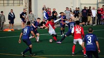 Members from the U.S. and Republic of Korea air forces play soccer during the Korean and American Friendship Day at Kunsan Air Base, Republic of Korea, Oct. 23, 2015. They participated in activities throughout the day to celebrate and strengthen the partnership shared by the ROK and U.S. (U.S. Air Force photo by Staff Sgt. Nick Wilson/Released)