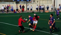Members from the U.S. and Republic of Korea air forces play soccer during the Korean and American Friendship Day at Kunsan Air Base, Republic of Korea, Oct. 23, 2015. They participated in activities throughout the day to celebrate and strengthen the partnership shared by the ROK and U.S. (U.S. Air Force photo by Staff Sgt. Nick Wilson/Released)