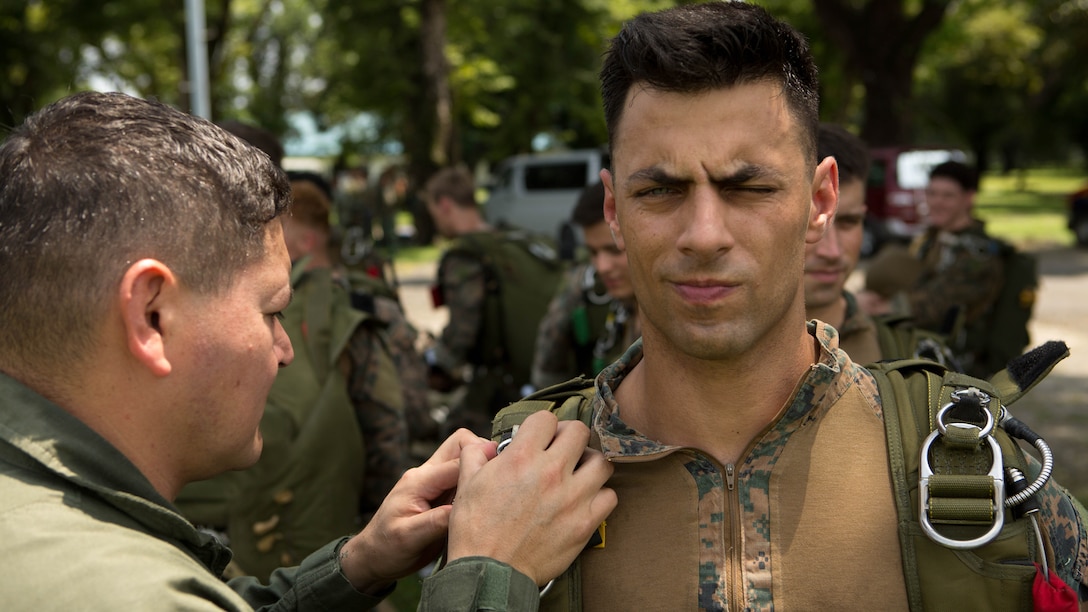 U.S. Marine Capt. Joshua D. Winters goes through a jump master parachute inspection while waiting for an MV-22B Osprey tiltrotor aircraft Oct. 3, 2015, as part of Amphibious Landing Exercise 2015 at Basa Air Base, Philippines. PHIBLEX is an annual, bilateral training exercise conducted by members of the Armed Forces of the Philippines alongside U.S. Marine and Navy forces. Winters is the commanding officer of the Maritime Raid Force, 31st Marine Expeditionary Unit. 