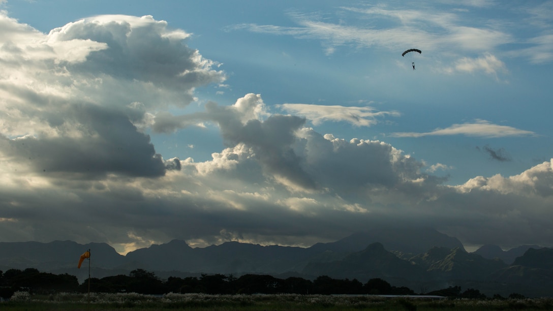 Philippine Air Force Capt. John Paul Delgado floats down to the drop zone during jump operations Oct. 5, 2015, as part of Amphibious Landing Exercise 2015 at Basa Air Base, Philippines. PHIBLEX is an annual, bilateral training exercise conducted by members of the Armed Forces of the Philippines alongside U.S. Marine and Navy forces. Delgado is a pilot in the Philippine Air Force. 