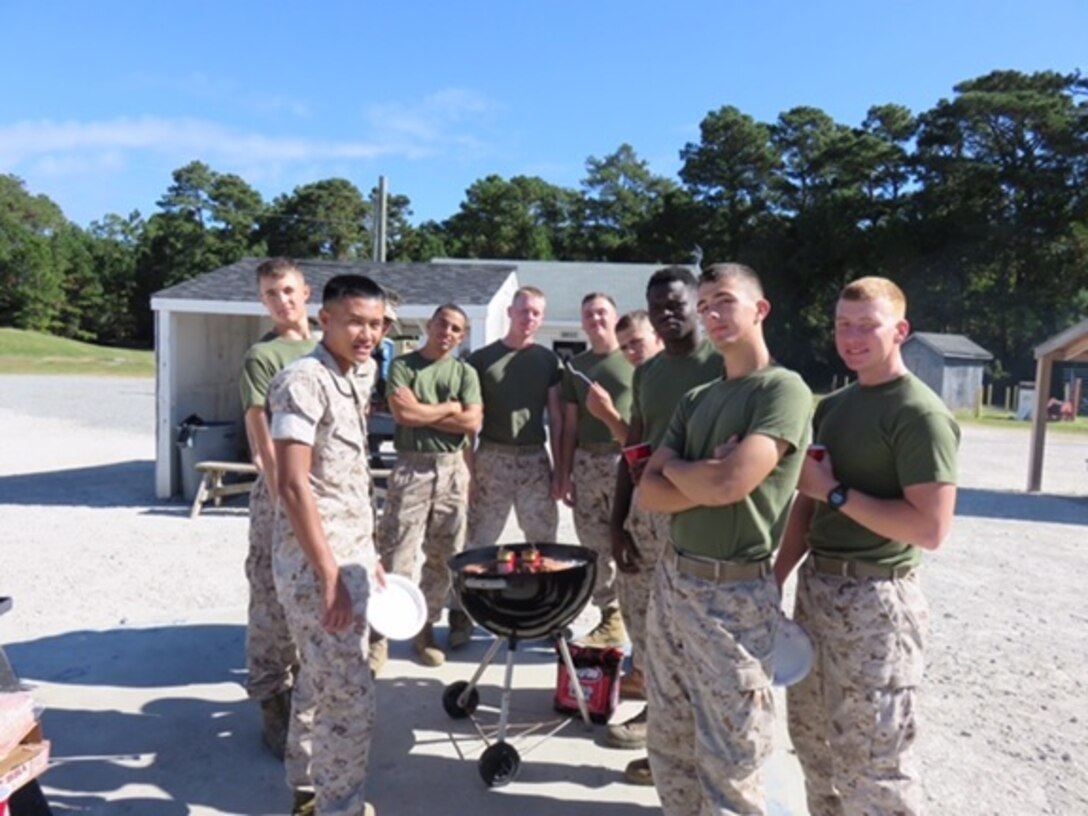 Marines from Basic Engineer Equipment Electrical Systems Technician 8-15 (BEEEST 8-15) celebrate their upcoming graduation with a class BBQ at Marine Corps Engineer School, Camp Lejeune, N.C. October 22, 2015.  The 19 Students completed and mastered each of the 17 tasks required to receive the 1142 Military Occupational Specialty (MOS).
