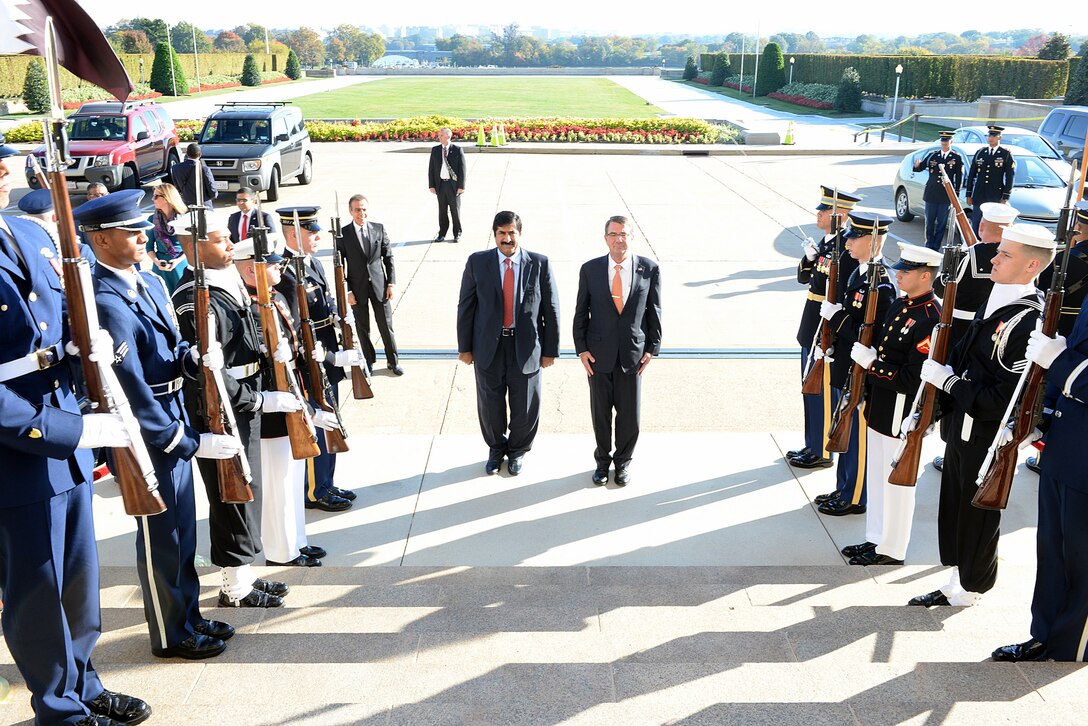 U.S. Defense Secretary Ash Carter stands with Qatari Minister of State for Defense Affairs Hamad bin Ali al-Attiyah during an honor cordon at the Pentagon, Oct. 23, 2015. DoD photo by U.S. Army Sgt. 1st Class Clydell Kinchen