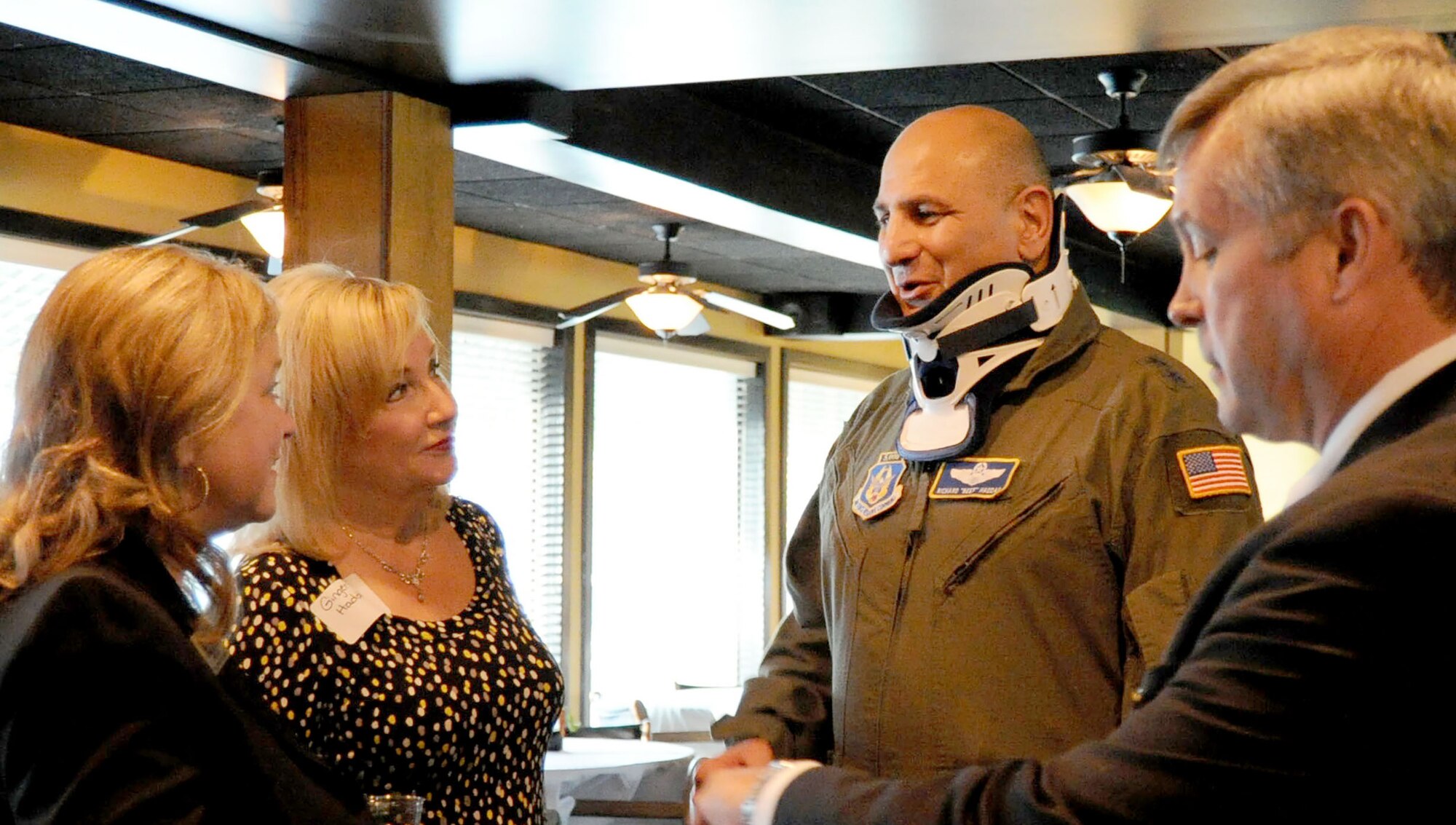 Maj. Gen. Richard S. “Beef” Haddad, Air Force Reserve Command vice commander, and his wife, Ginger, left, converse with community members during the Business After Hours event hosted by the Robins Regional and Perry Chambers of Commerce Oct. 22, in Perry, Ga. The events are held periodically by both chambers to allow community, business and the military leaders to network and fellowship. (U.S. Air Force photo/Tech Sgt. Mercedes Crossland)