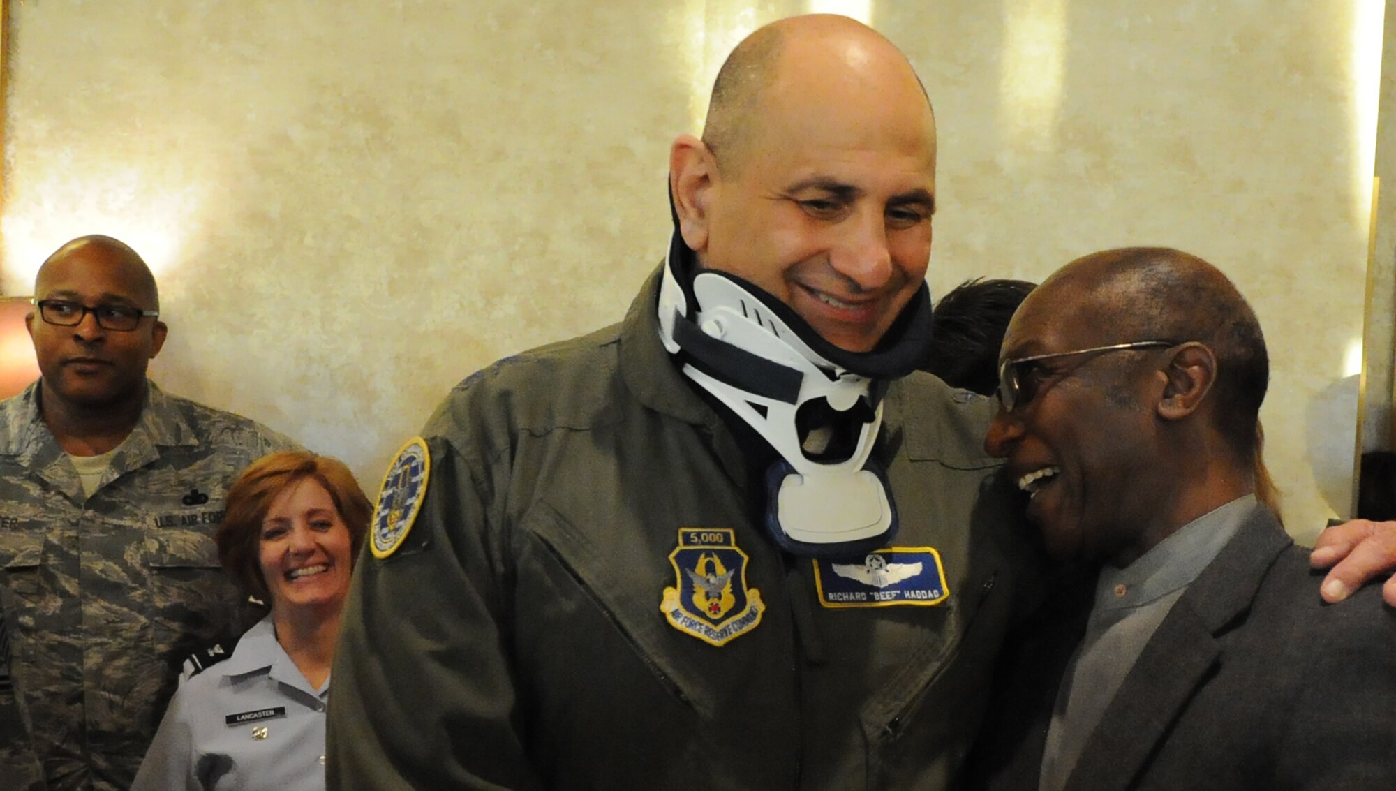 Maj. Gen. Richard S. “Beef” Haddad, Air Force Reserve Command vice commander, shares a light moment with retired Col. Henry Childs during the Business After Hours event hosted by the Robins Regional and Perry Chambers of Commerce Oct. 22 in Perry, Ga. The events are held periodically by both chambers to allow community, business and the military leaders to network and fellowship. (U.S. Air Force photo/Tech Sgt. Mercedes Crossland)