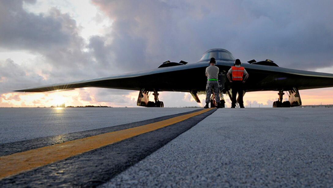 Crew chiefs assigned to the 509th Aircraft Maintenance Squadron prepare to launch a B-2 Spirit at Andersen Air Force Base, Guam, Aug. 12, 2015.  Three B-2s and about 225 Airmen from Whiteman Air Force Base, Missouri, deployed to Guam to conduct familiarization training activities in the Indo-Asia-Pacific region. (U.S. Air Force photo by Senior Airman Joseph A. Pagán Jr./Released)