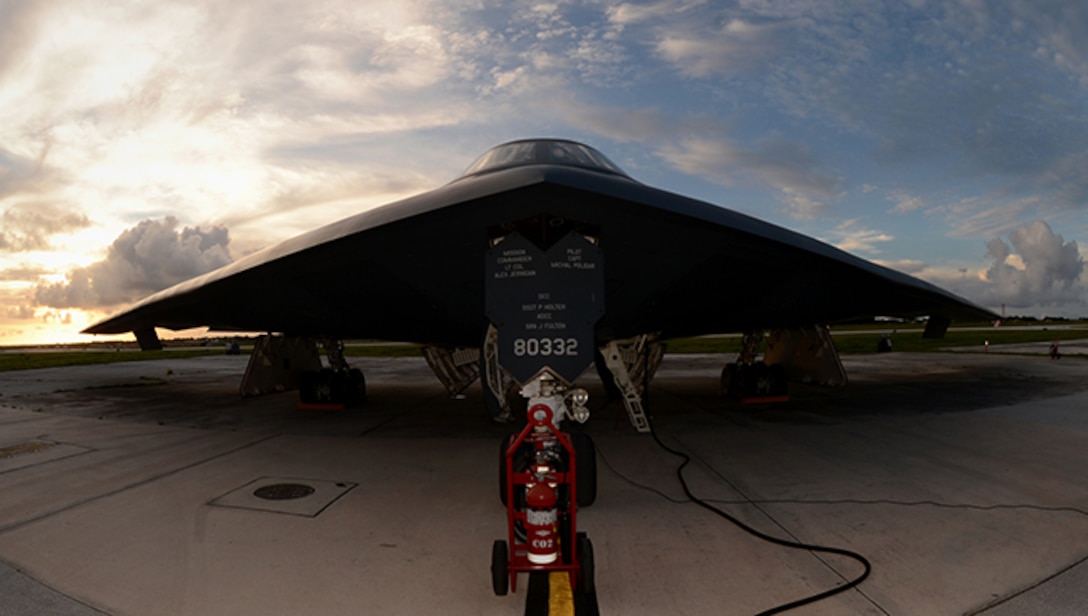 A B-2 Spirit is prepared for a mission on the flightline at Andersen Air Force Base, Guam, Aug. 12, 2015. Three B-2s and about 225 Airmen from Whiteman Air Force Base, Missouri, deployed to Guam to conduct familiarization training activities in the Indo-Asia-Pacific region. (U.S. Air Force photo by Senior Airman Joseph A. Pagán Jr./Released)