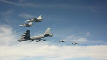 150612-N-ZZ999-001  Baltic Sea (June 12, 2015) -- A U.S. Air Force B-52 flies with Swedish SAAB Gripins during Baltic Operations 2015. BALTOPS is an annual multinational exercise designed to enhance flexibility and interoperability, as well as demonstrate resolve among allied and partner forces to defend the Baltic region. (U.S. Navy/Released) 