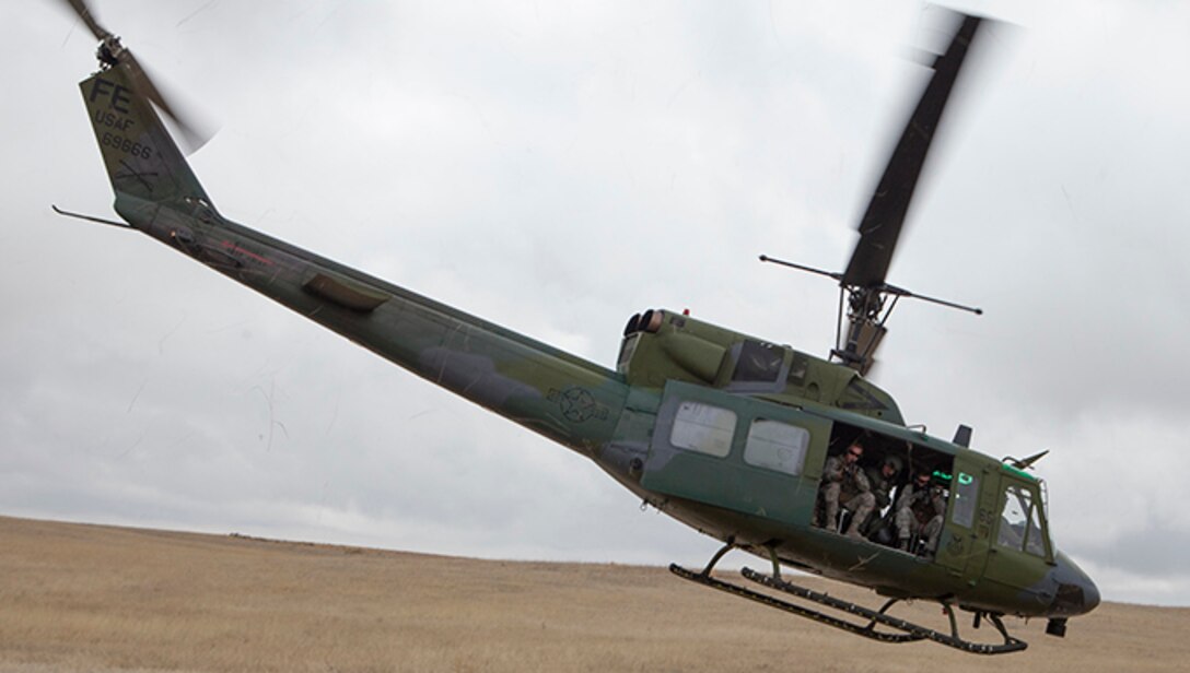 A UH-1N Huey with 37th Helicopter Squadron conducts a security patrol in the missile field East of F.E. Warren Air Force Base, April 8, 2015. 37th HS pilots routinely patrol the missile field to maintain a security presence to protect our country's nuclear assets. (U.S. Air Force photo by Lan Kim)