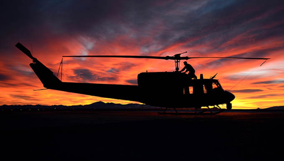 Staff Sgt. Ryan Oliver, 40th Helicopter Squadron special missions aviator, inspects the rotor on a UH-N1 Huey Jan. 27, 2015, at Malmstrom Air Force Base, Mont. Oliver completes a pre-flight inspection prior to each flight to ensure there are no mechanical faults in the aircraft. (U.S. Air Force photo/ Airman 1st Class Dillon Johnston) 


 

