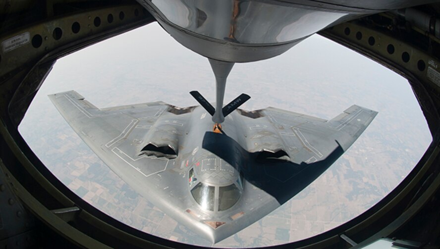 ALTUS AIR FORCE BASE, Okla. – A KC-135 Stratotanker from Altus AFB refuels a B-2 Spirit Stealth Bomber from Whiteman AFB, Mo. during a refueling training mission, Aug. 29, 2012. The KC-135 Stratotanker aircrew was assigned to refuel a B-2 Spirit Stealth Bomber in support of a training mission. (U.S. Air Force photo by Airman 1st Class Franklin R. Ramos / 97th Air Mobility Wing / Released) 