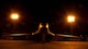 A B-1 bomber shrouded in the glow of lights in the aircraft parking area sits silently at Ellsworth Air Force Base, S.D., July 24, 2012. The B-1 is a long-range, multi-role heavy bomber that can reach speeds of 900-plus miles per hour. (U.S. Air Force photo by Airman 1st Class Zachary Hada/Released)
