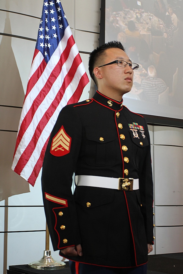 Sgt. Kevin Han, recruiter with Recruiting Sub Station Hollywood, Calif., waits to give the command "march" to poolees, individuals who have taken the oath of enlistment, during a World War II Victory Luncheon and Celebration at the Skirball Cultural Center in Los Angeles, Oct. 14, 2015. During the celebration, poolees from all branches of the military participated in a swear-in-ceremony, and spoke to World War II veterans about their experiences in the military. (U.S. Marine Corps photo by Sgt. Alicia R. Leaders/Released)