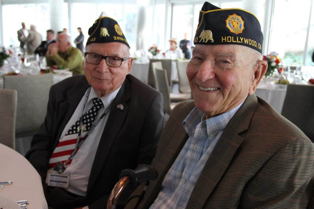 World War II Veterans pose for a photo during a World War II Victory Luncheon and Celebration at the Skirball Cultural Center in Los Angeles, Oct. 14, 2015. Poolees from Recruiting Sub Station Hollywood, Calif., participated in a swear-in-ceremony and spoke to World War II veterans about their experiences in the military. (U.S. Marine Corps photo by Sgt. Alicia R. Leaders/Released)