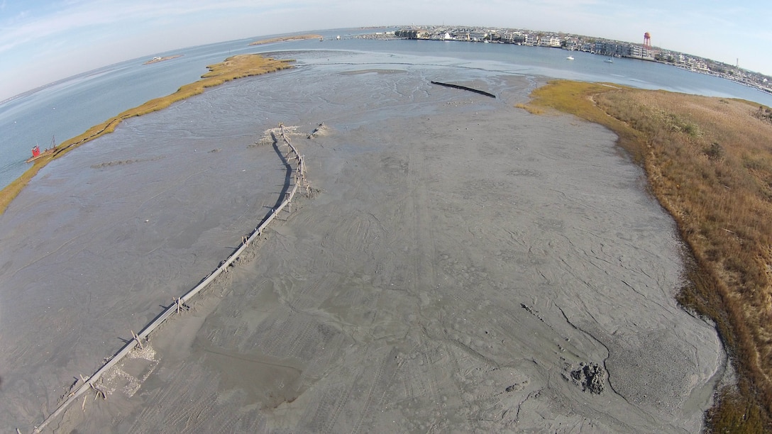 The U.S. Army Corps of Engineers' Philadelphia District and its contractor Barnegat Bay Dredging Company conduct dredging operations and marsh restoration at Mordecai Island, NJ in October of 2015. USACE is dredging critical shoals from the New Jersey Intracoastal Waterway and using the material to restore a portion of Mordecai Island marshland. The island serves two important functions within Barnegat Bay: it provides habitat for wildlife and augments overall coastal resiliency for the backbay communities of Long Beach Island. 