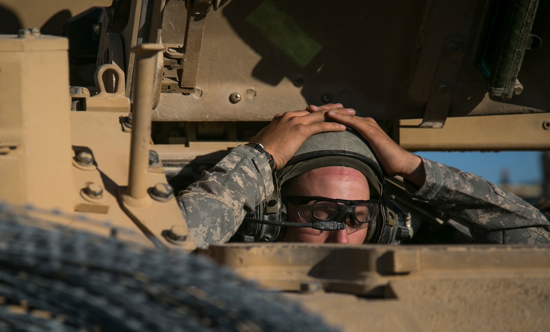 A soldier takes a rest during Exercise Decisive Action Rotation 16-01 on Fort Irwin, Calif., Oct. 9, 2015. U.S. Army photo by Sgt. Richard W. Jones Jr.