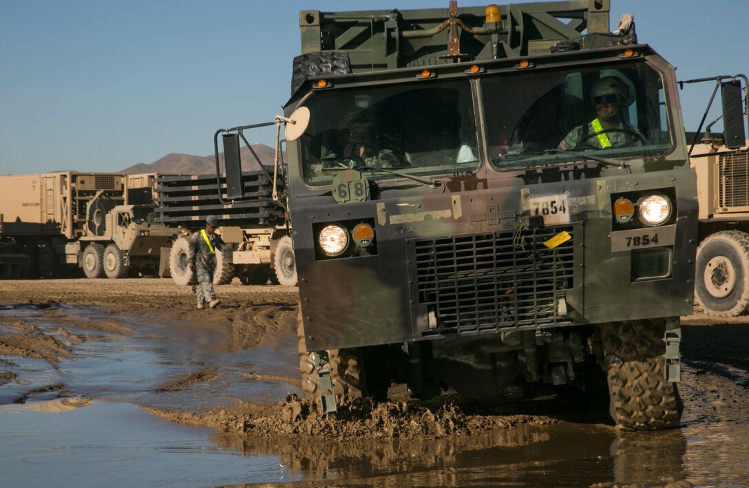Soldiers convoy to the first tactical assembly area during Exercise Decisive Action Rotation 16-01 on Fort Irwin, Calif., Oct. 9, 2015. U.S. Army photo by Sgt. Richard W. Jones Jr.
