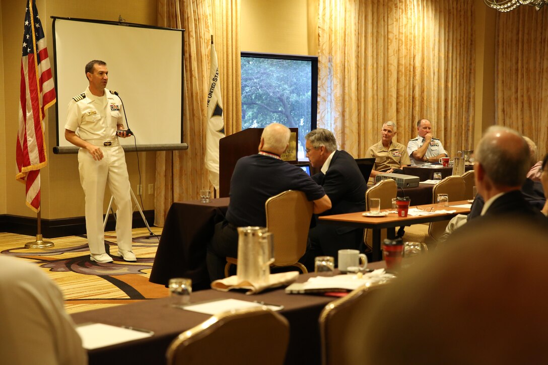 Capt. Scott Gootee, commander of Naval Air Station Joint Reserve Base New Orleans, addresses members of the Naval Order of the United States during their 125th Annual Congress Oct. 23, 2015, at the Intercontinental Hotel in New Orleans. Gootee joined Lt. Gen. Rex McMillian, commander of Marine Forces Reserve and Marine Forces North, and Rear Adm. David Callahan, commander of Eighth Coast Guard District, to address the crowd about the history and evolution of the Marine Corps Reserve, Coast Guard and Naval Reserve components into the comprehensive readiness forces they are today. According to retired Navy Capt. Gary Bair, the host committee chairman for the national congress of the Naval Order of the United States, the purpose of the congress is to preserve and promote naval service history and heritage. The NOUS is open to veterans of each of the naval services, as well as their descendants. 