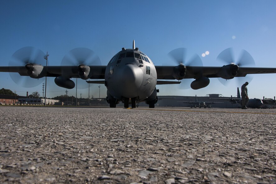 A U.S. Air Force C-130 Hercules prepares it’s engines for take-off from the flight line at Dobbins Air Reserve Base, Ga. Oct. 15, 2015. The 700th Airlift Squadron performed personnel drops working with 4th Recon Battalion Bravo Company. This exercise marked the first time in four years that these units had worked together for parachutes jumps. (U.S. Air Force photo/ Staff Sgt. Daniel Phelps)