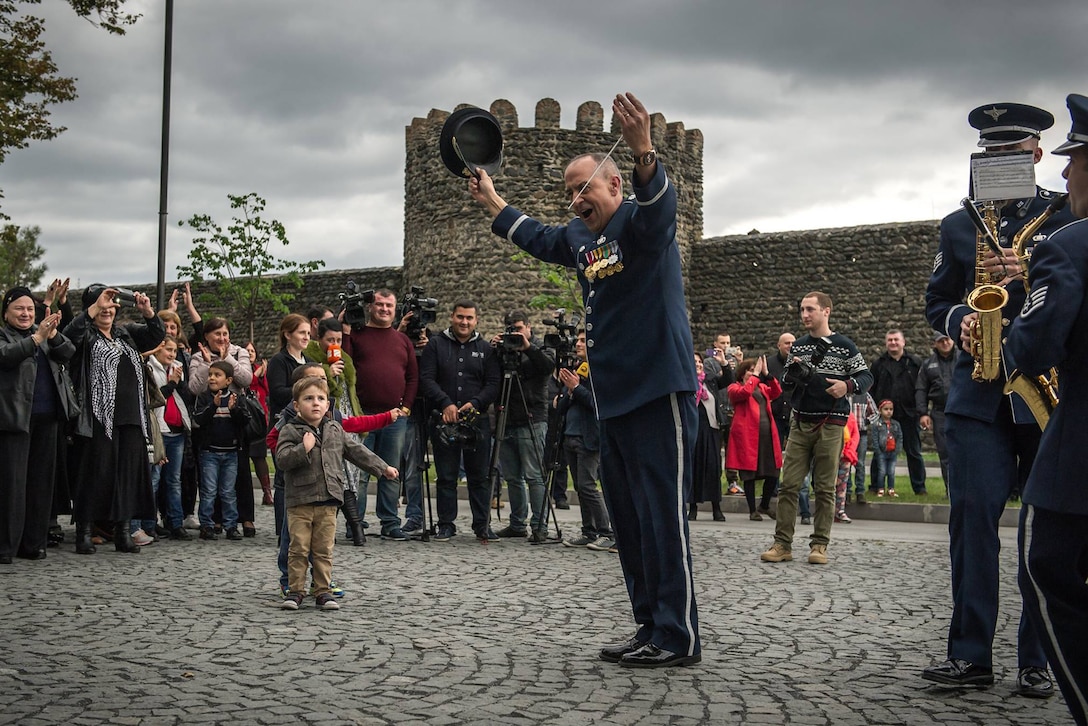 U.S. Air Force Lt. Col. Michael Mench thanks the audience during a marching band performance in Kvareli, Georgia, Oct. 18, 2015. Mench, the U.S. Air Forces in Europe Band commander, and other members of the band are participating in multiple events in the country over several days as part of the first visit the band has made to Georgia in nearly a decade. U.S. Air Force photo by Tech. Sgt. Ryan Crane